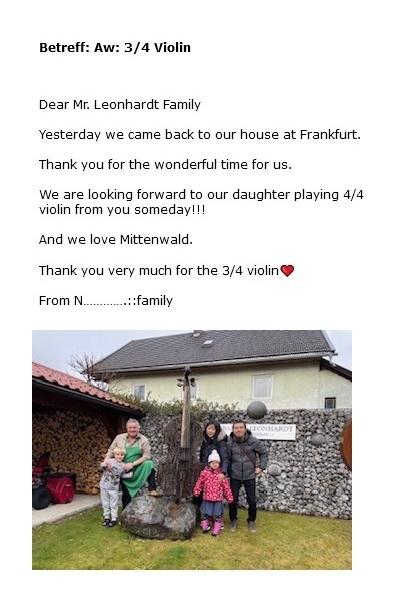 Happy family with new 3/4 violin